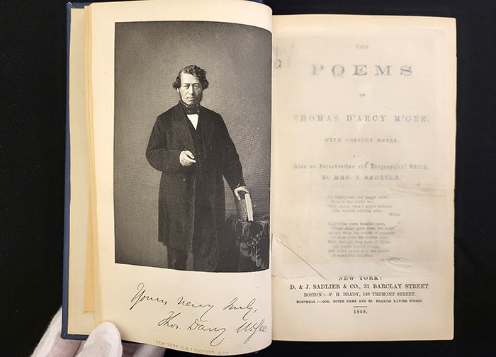 open book showing ink engraving of Thomas D'Arcy McGee on left and title page on right