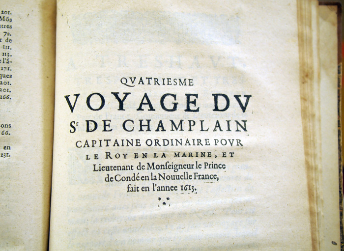 Title page of the book Les voyages du Sieur de Champlain Xaintongeois, capitaine ordinaire pour le Roy, en la marine [translation : The travels of Sieur de Champlain Xaintongeois, ordinary captain for the King, in the Navy]