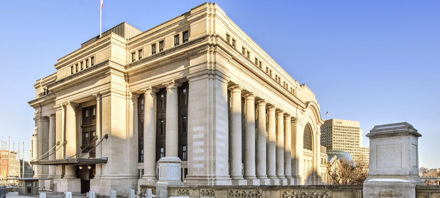 The Senate of Canada Building, a former train station lined with stone columns.