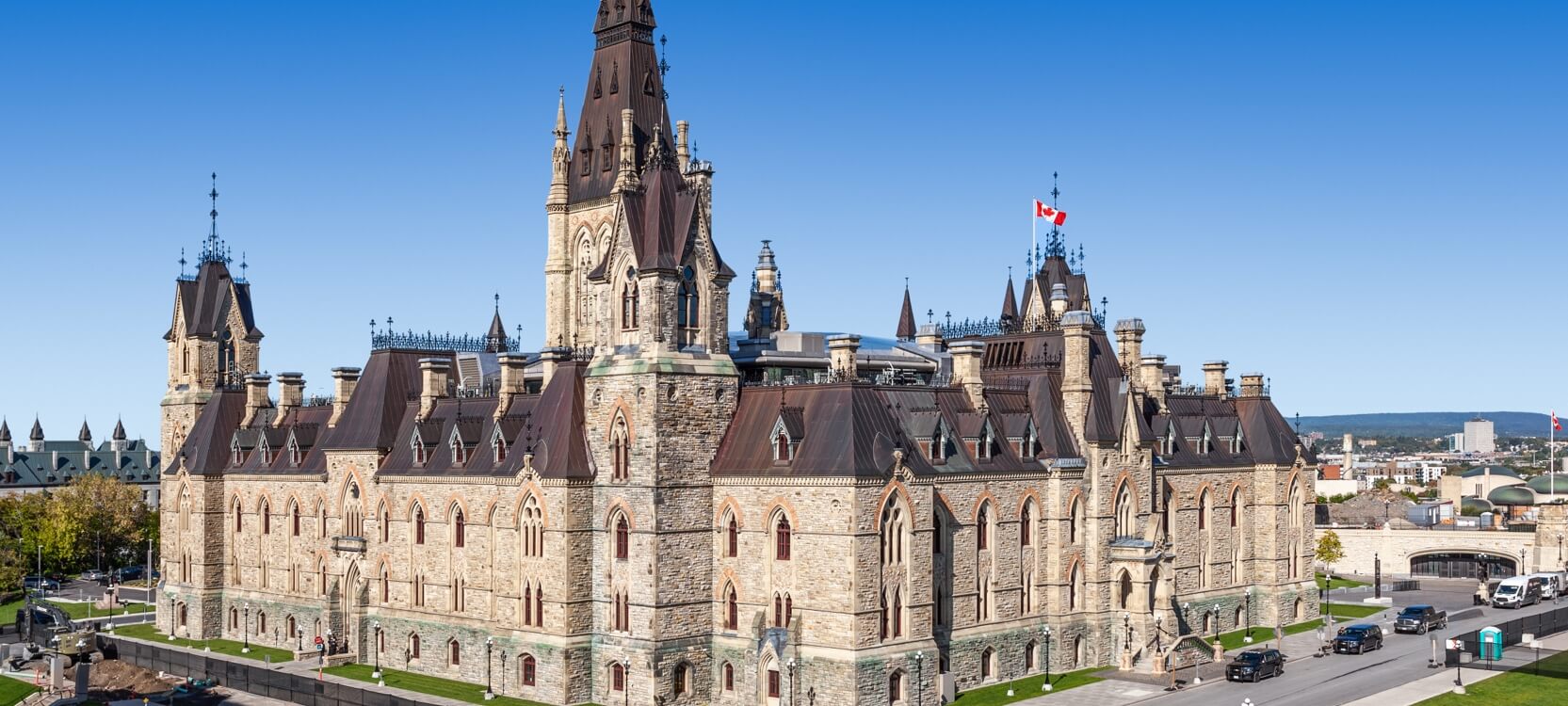 West Block, a Neo-Gothic building with a dark brown copper roof.